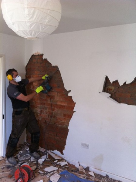 Old plaster removed from a damp wall, ready for new plaster