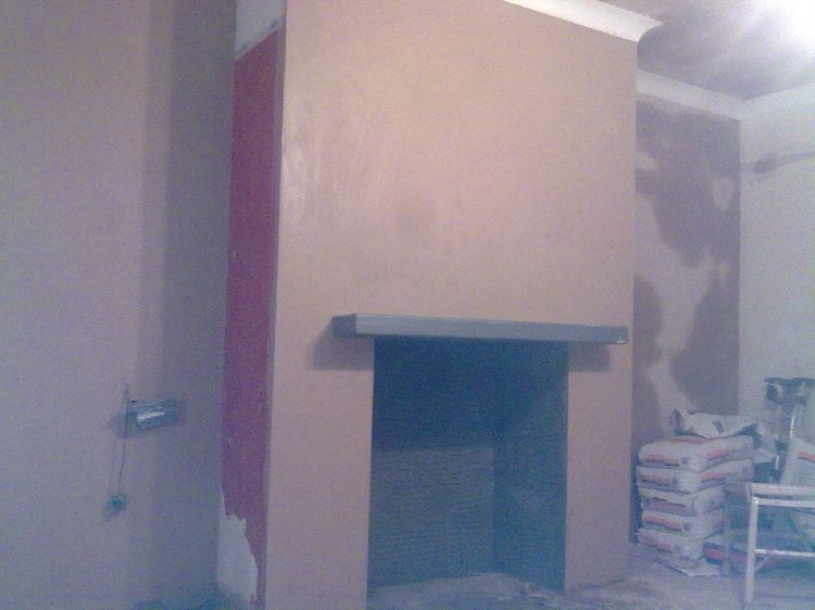 An oak beam put in and the plastering done around it