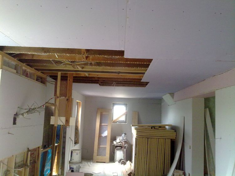 Plasterboarding the ceiling