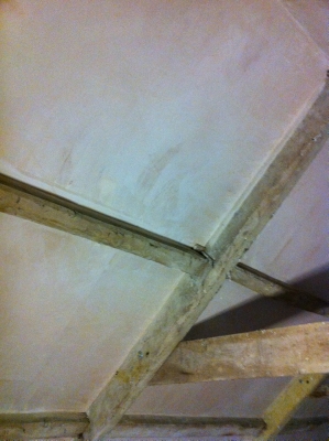 Vaulted ceiling plastered to the ridge
